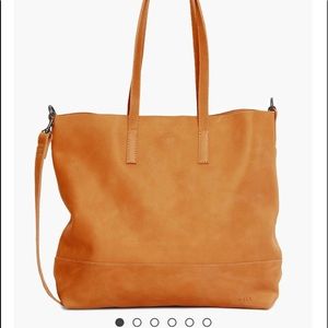 ABLE leather tote with crossbody strap.